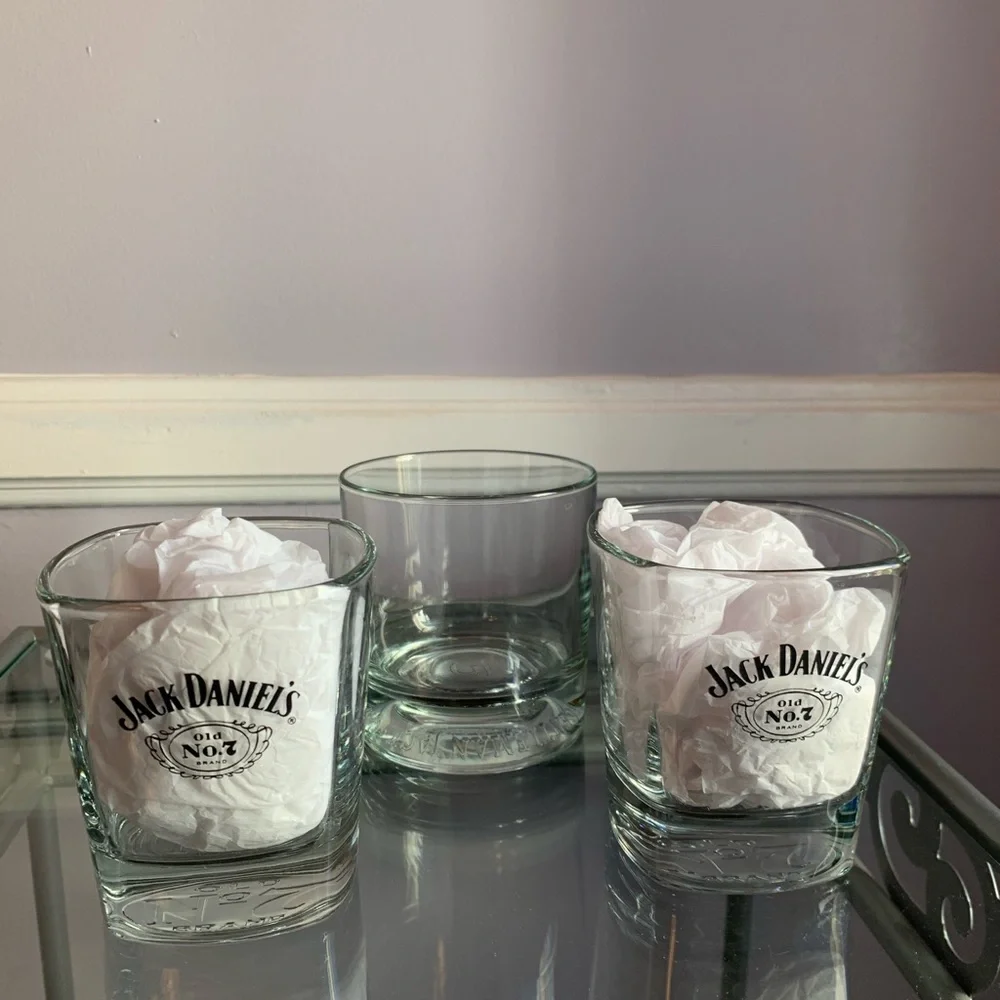 3 bar glasses including 2 square Jack Daniels and 1 Gentlemen Jack tumbler